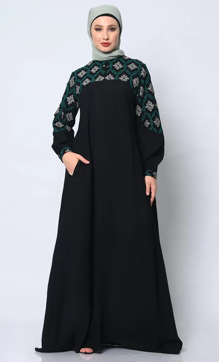 Elegant Simplicity: Embroidered Black Abaya with Box Pleats and Dual Pockets