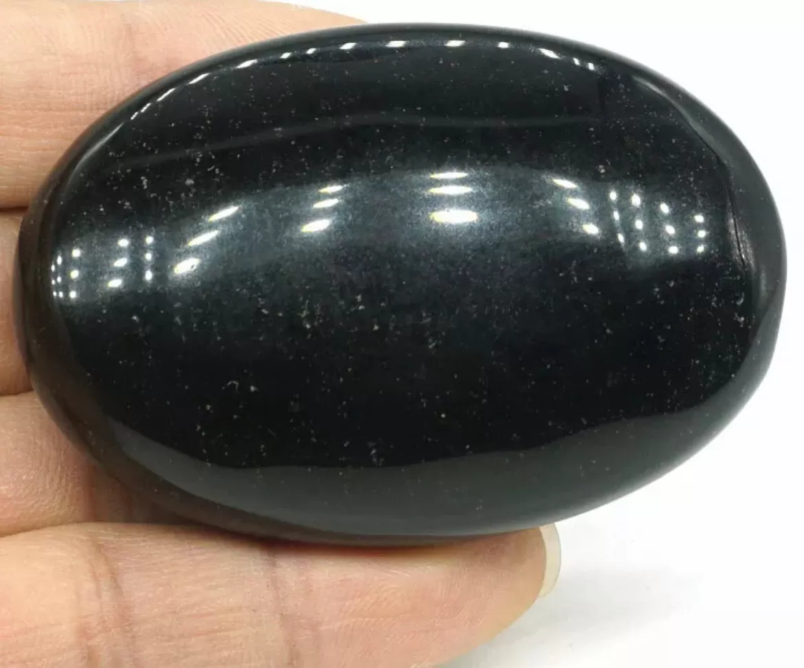 Natural black obsidian gemstone palm stone